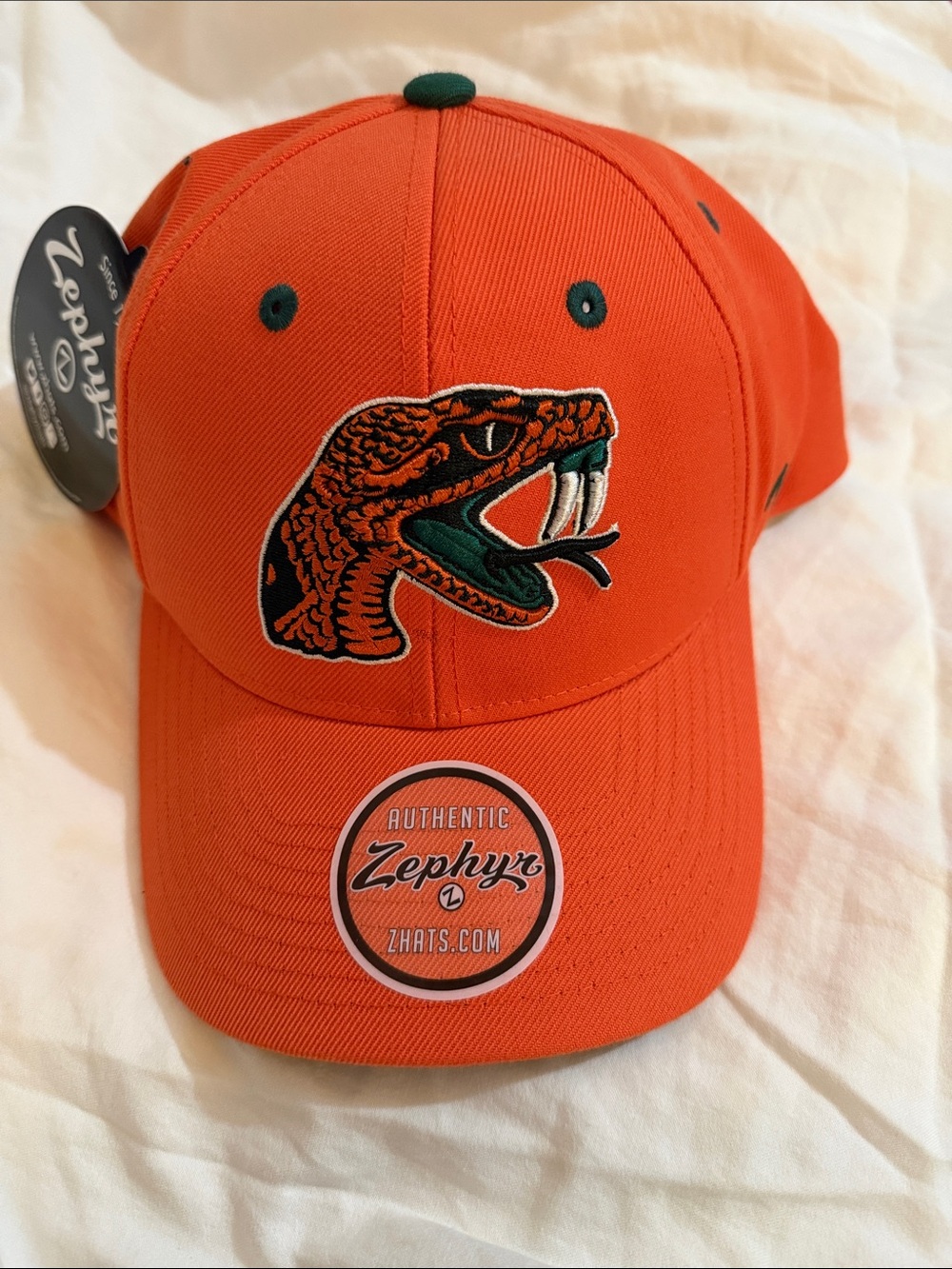 Zephyr Orange Baseball Cap with Green & Black Snake Patch